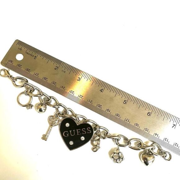 GUESS SILVER TONE CHAIN BLACK HEART CRYSTAL LOGO LOCK & KEY CHARM BRACELET - Picture 6 of 9